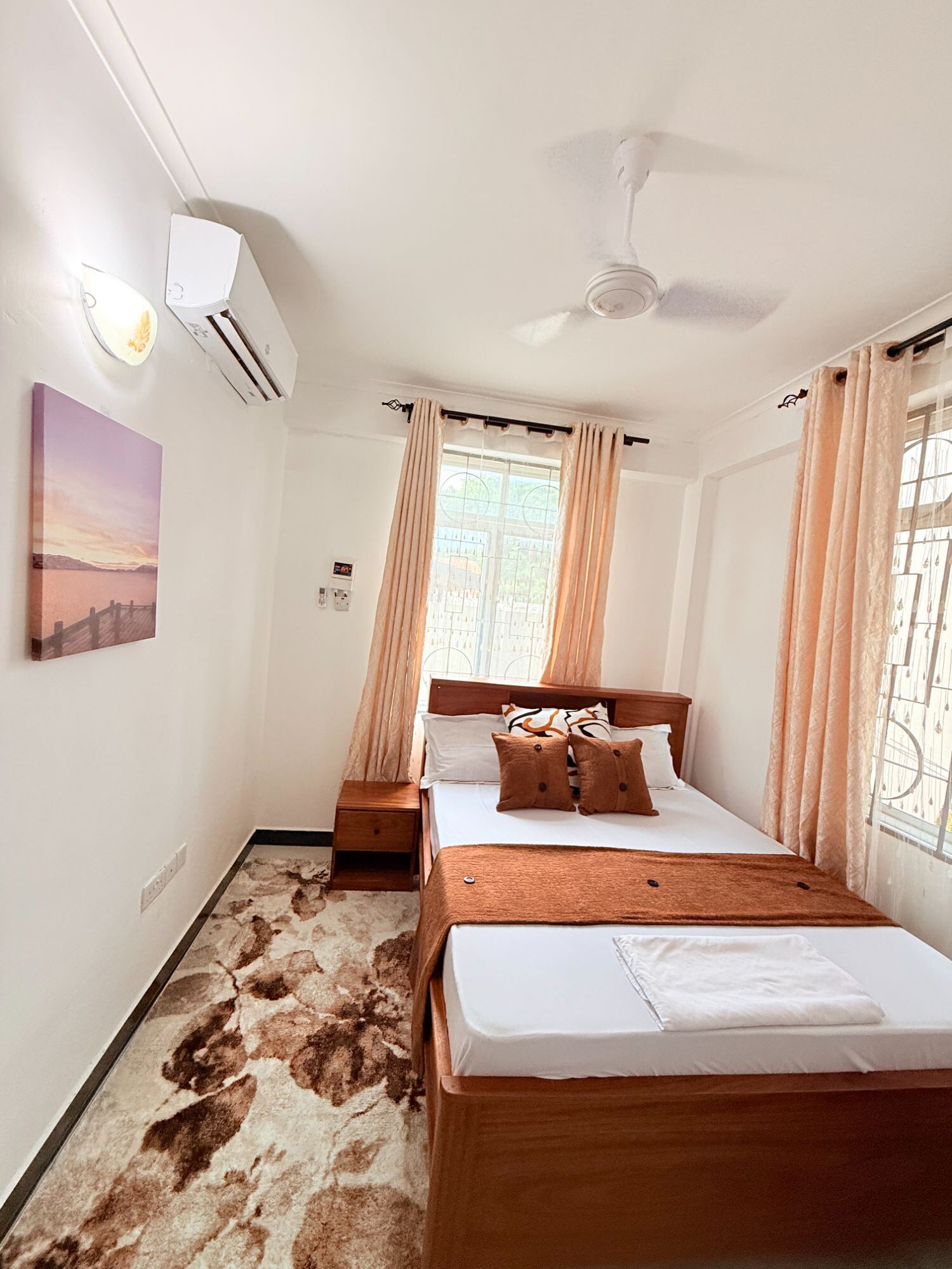 Mikocheni bedroom with double bed