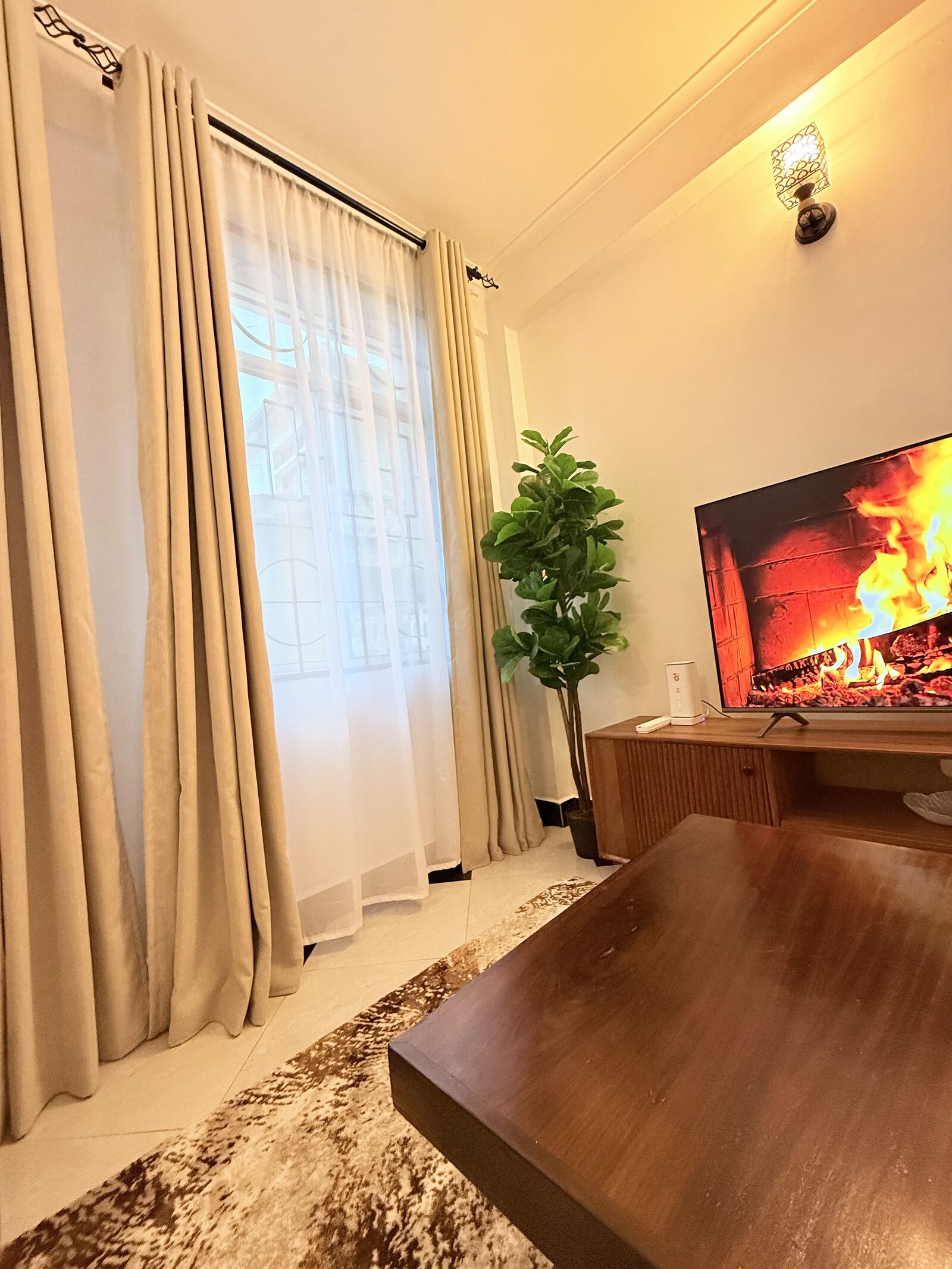 Mikocheni living room with smart TV